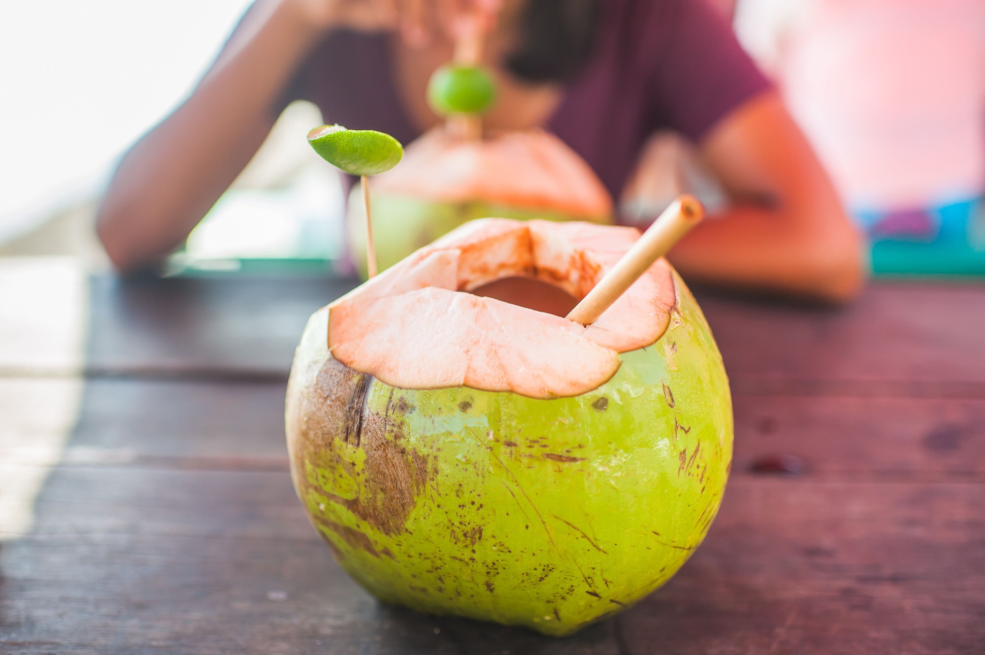 Drink-Fresh-Young-Coconut-With-Bamboo-Straw-Royalty-Free-Image-998252978-1562924707.Jpg